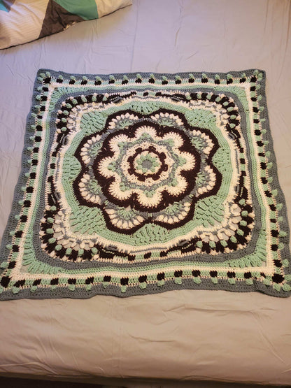 Crocheted Heritage Mandala Baby Girl Blanket, 42-inch square, intricate artistic design.