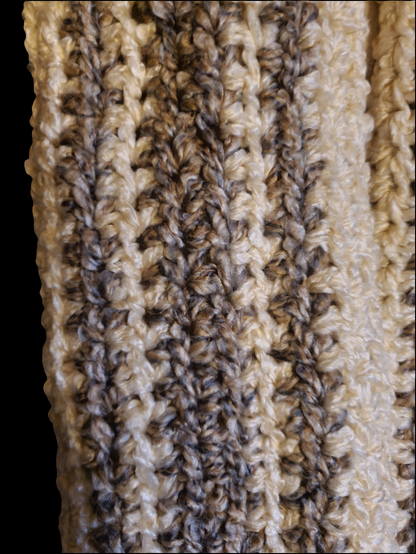 Soft thick handmade crocheted gray and white infinity scarf texture.