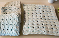 Handmade textured aqua dishcloths set of four, ideal for washing dishes.