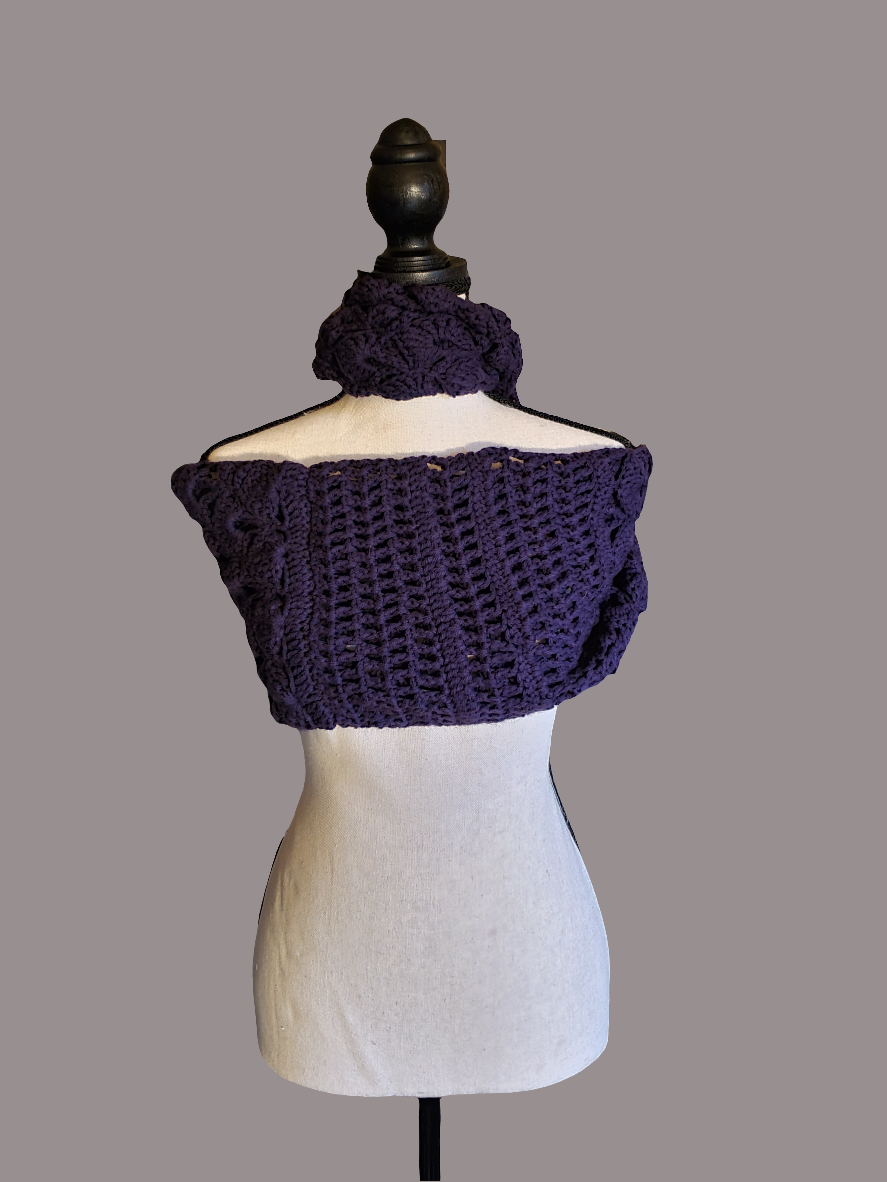 beautiful handmade crocheted purple infinity scarf on mannequin