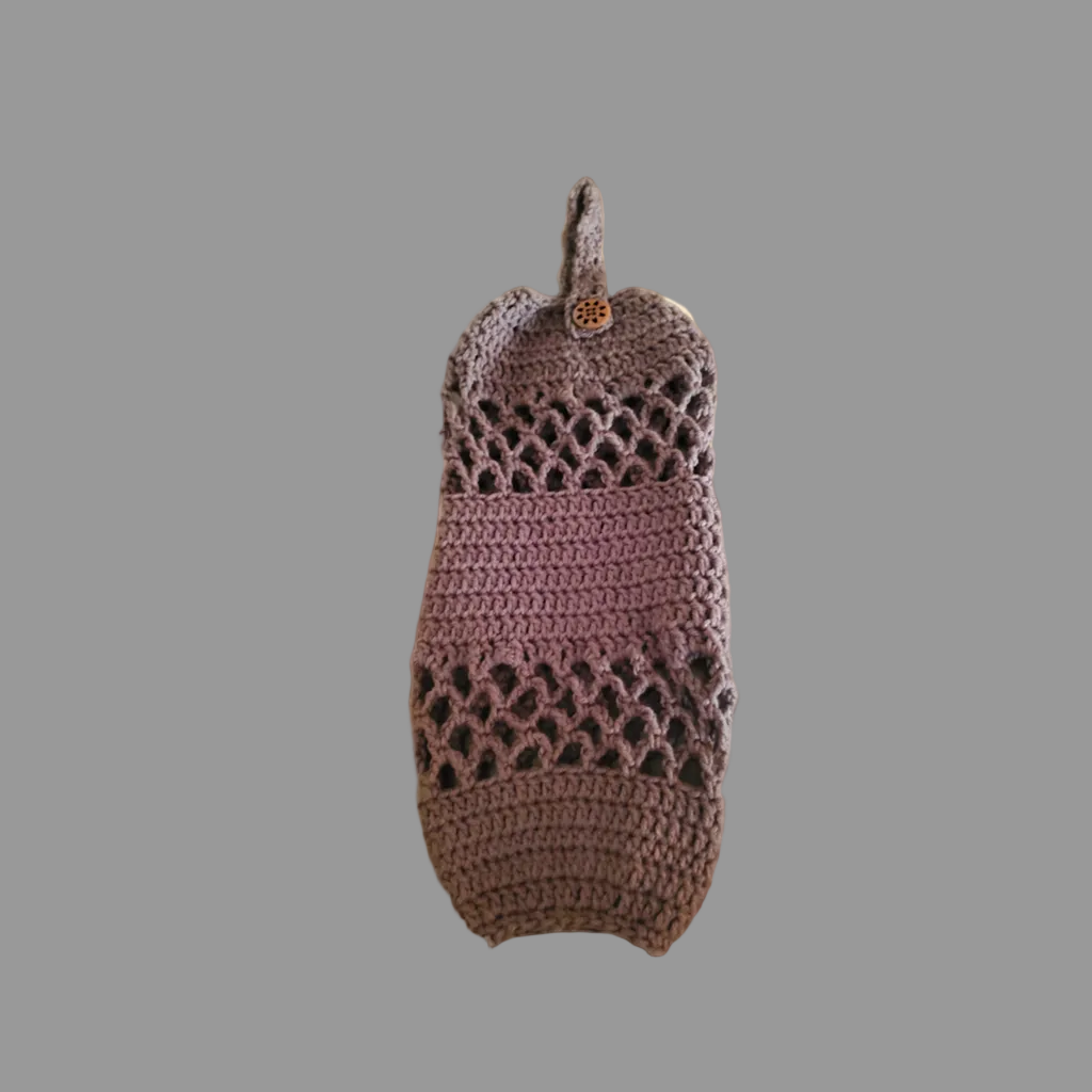 Handmade crocheted acrylic plastic bag holder, elegant design for organizing bags.