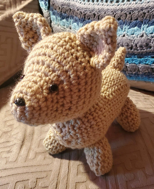 Crocheted Stuffed Dog Chihuahua on a cozy couch.